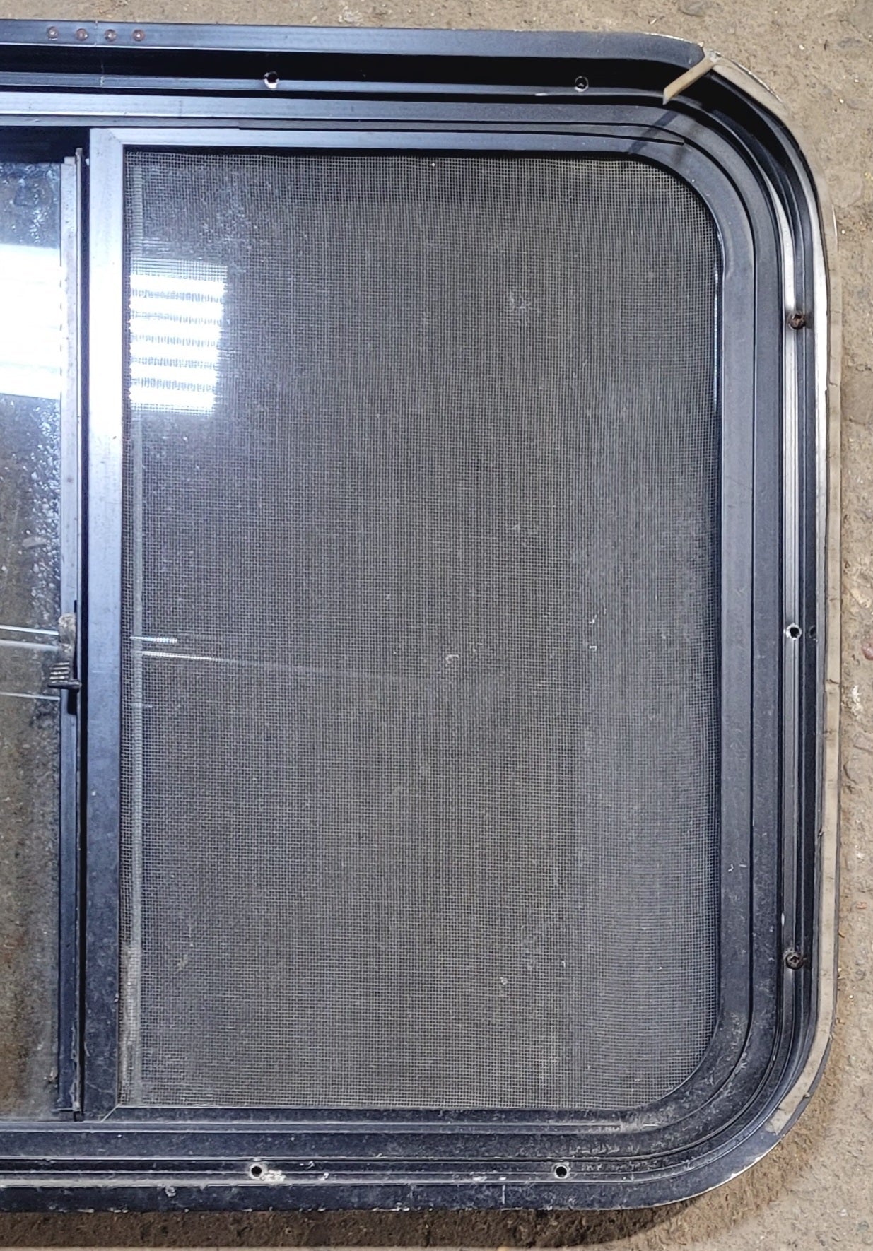 Used Black Radius Opening Window : 25 1/2" W x 20" H x 1 3/4" - Young Farts RV Parts