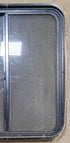 Used Black Radius Opening Window : 25 1/2" W x 28 1/2" H x 1 3/4" - Young Farts RV Parts