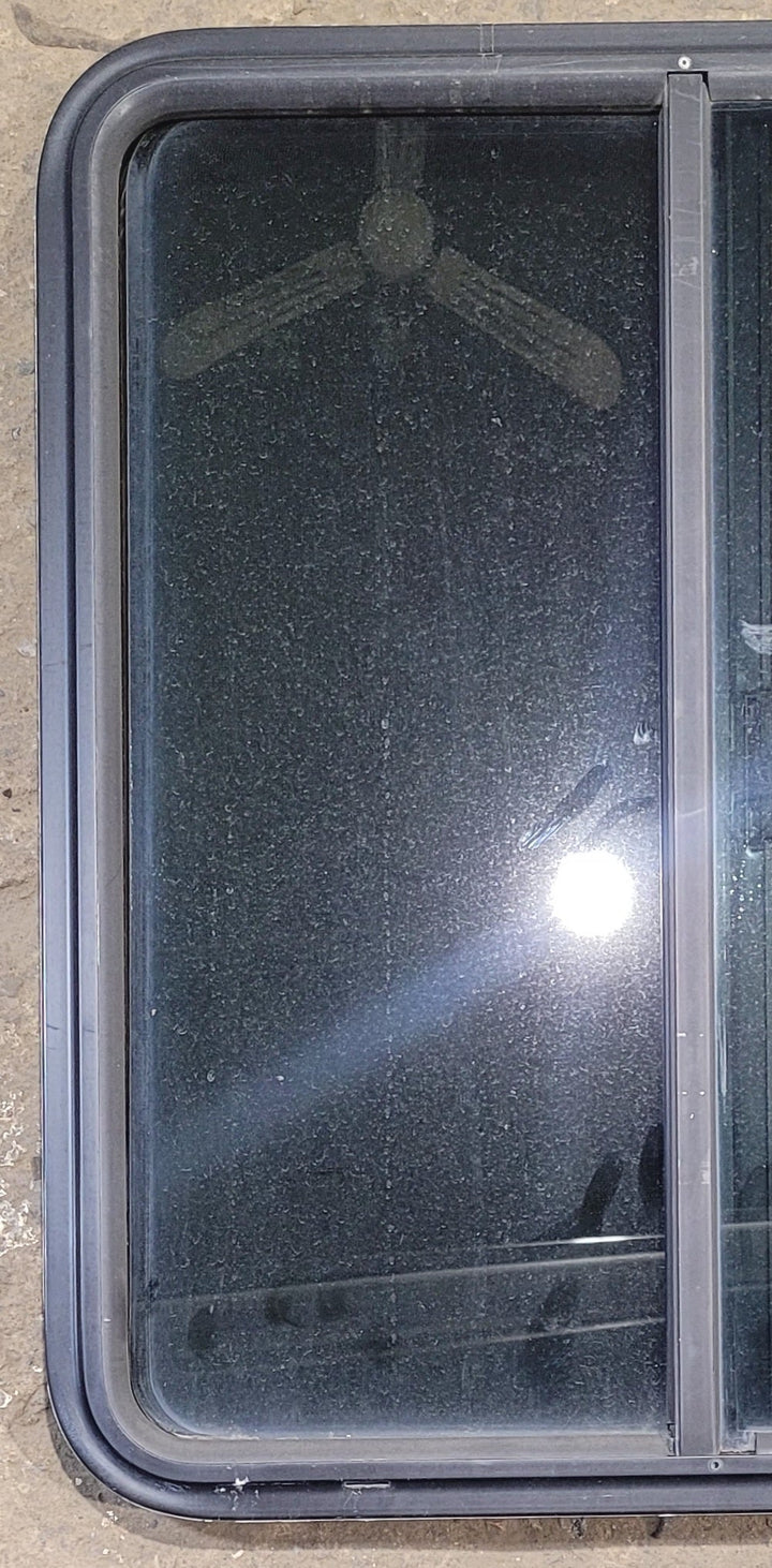 Used Black Radius Opening Window : 25 3/4" W x 29 1/4" H x 1 3/4" - Young Farts RV Parts