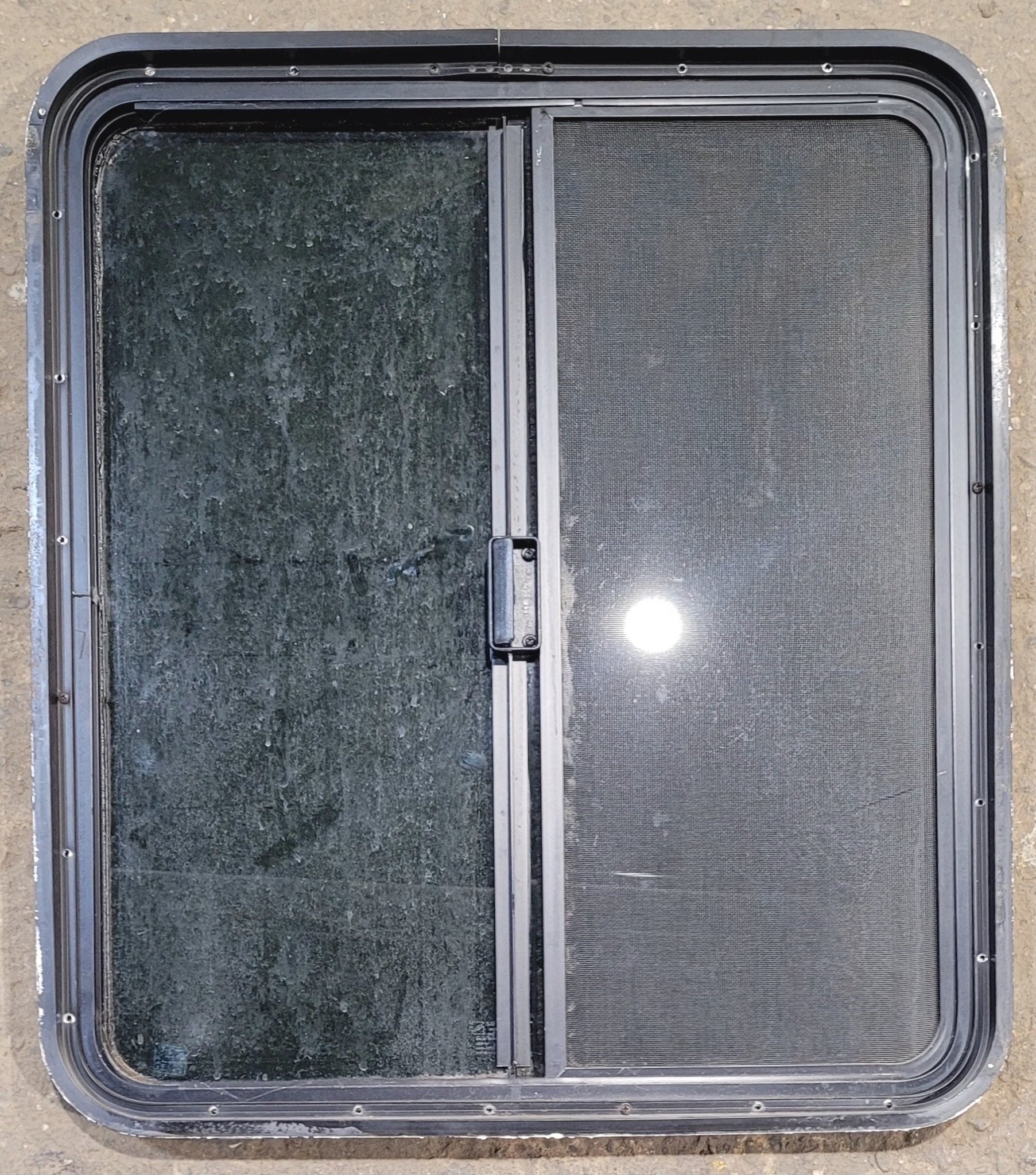 Used Black Radius Opening Window : 25 3/4" W x 29 1/4" H x 1 3/4" - Young Farts RV Parts