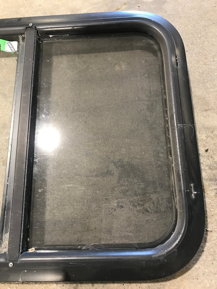 Used Black Radius Opening Window : 27 3/4" W x 18" H x 1 3/4" - Young Farts RV Parts
