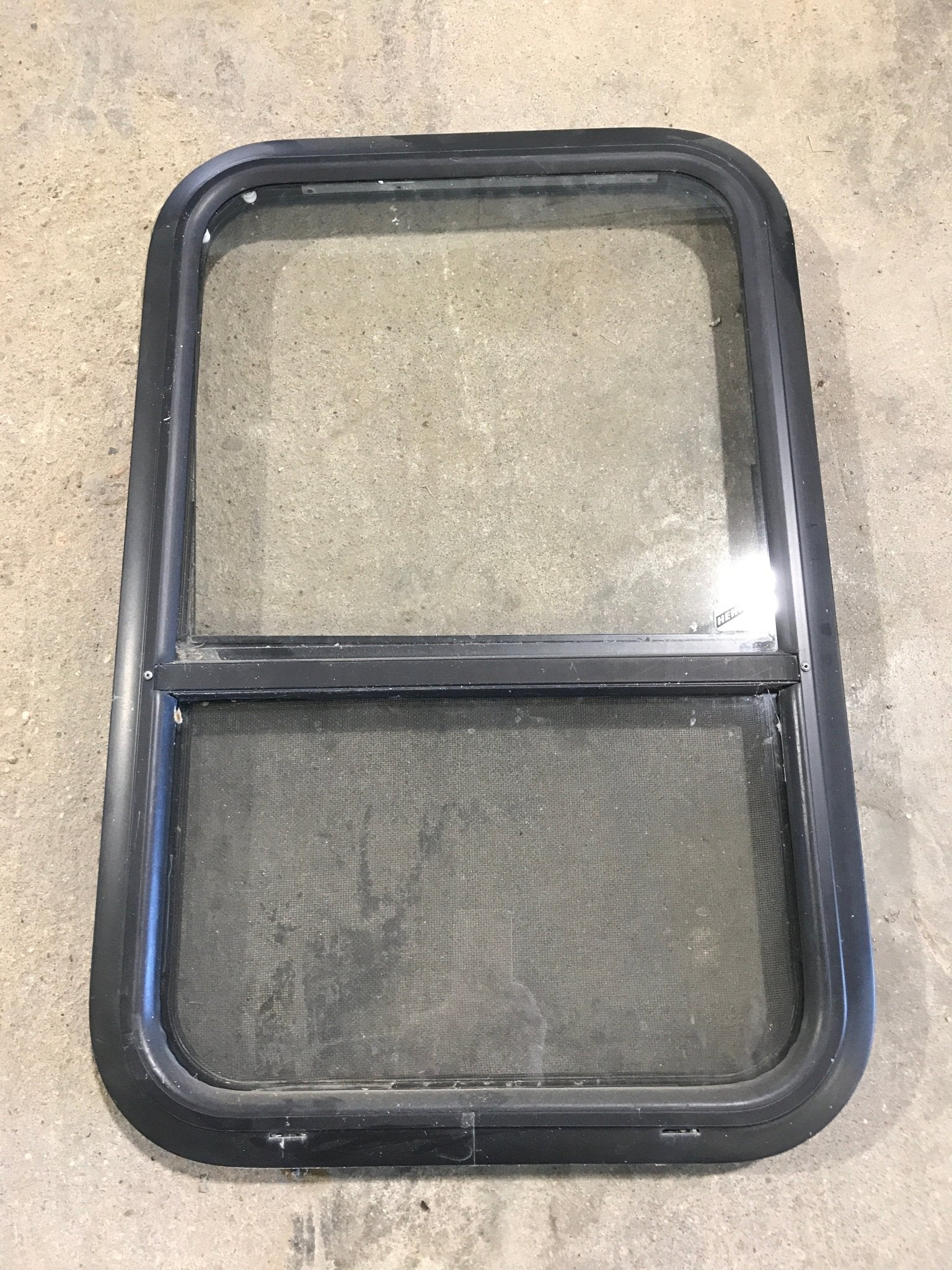 Used Black Radius Opening Window : 27 3/4" W x 18" H x 1 3/4" - Young Farts RV Parts
