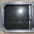 Used Black Radius Opening Window : 29 1/2" W x 14 1/2" H x 1 1/4" - Young Farts RV Parts