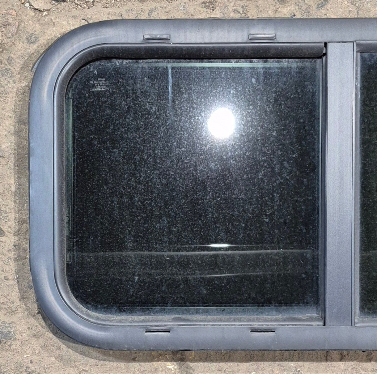 Used Black Radius Opening Window : 29 1/2" W x 14 1/2" H x 1 1/4" - Young Farts RV Parts