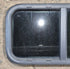 Used Black Radius Opening Window : 29 1/2" W x 14 1/2" H x 1 1/4" - Young Farts RV Parts