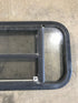 Used Black Radius Opening Window : 29 1/2" W x 14 1/2" H x 2" - Young Farts RV Parts