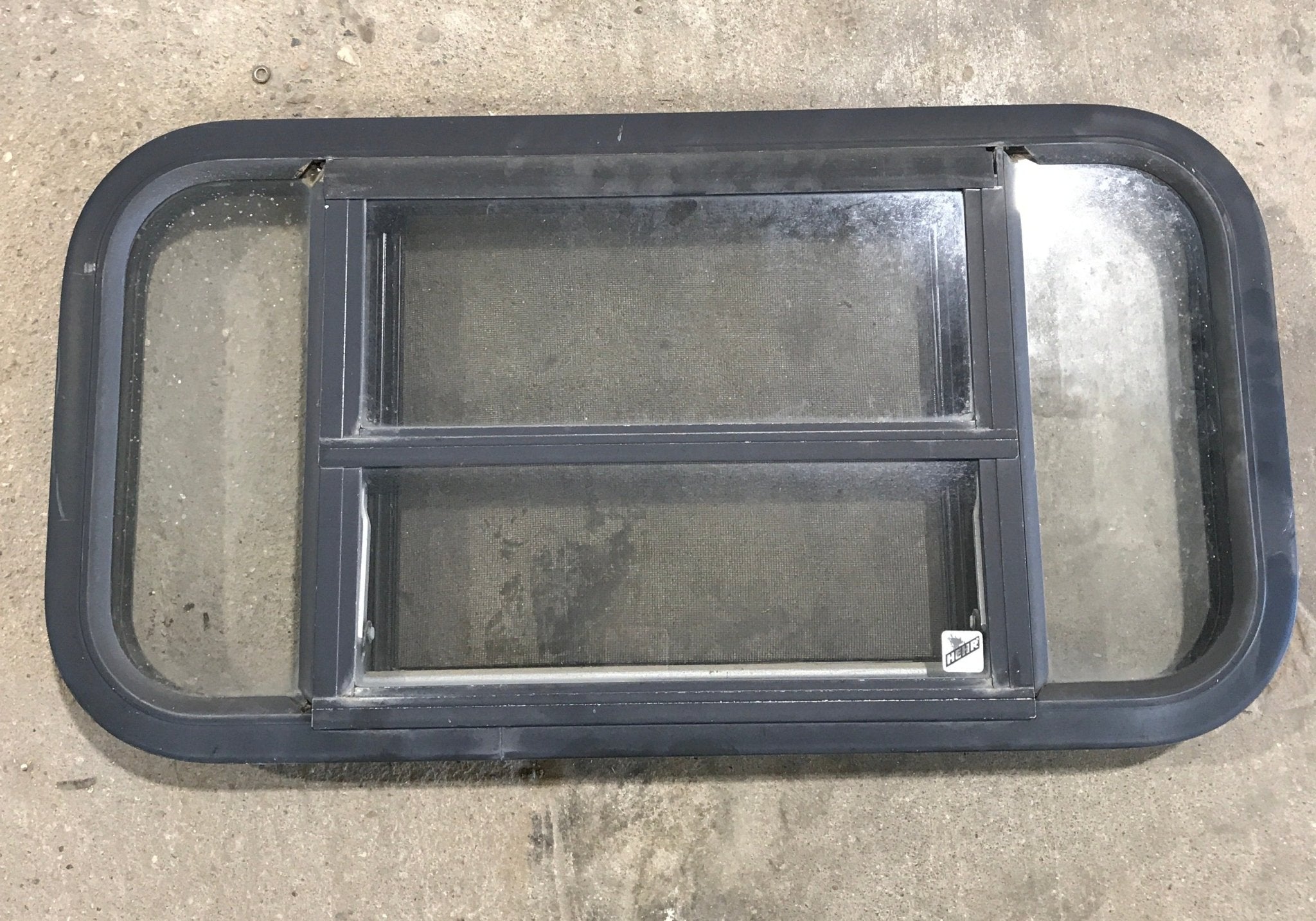 Used Black Radius Opening Window : 29 1/2" W x 14 1/2" H x 2" - Young Farts RV Parts