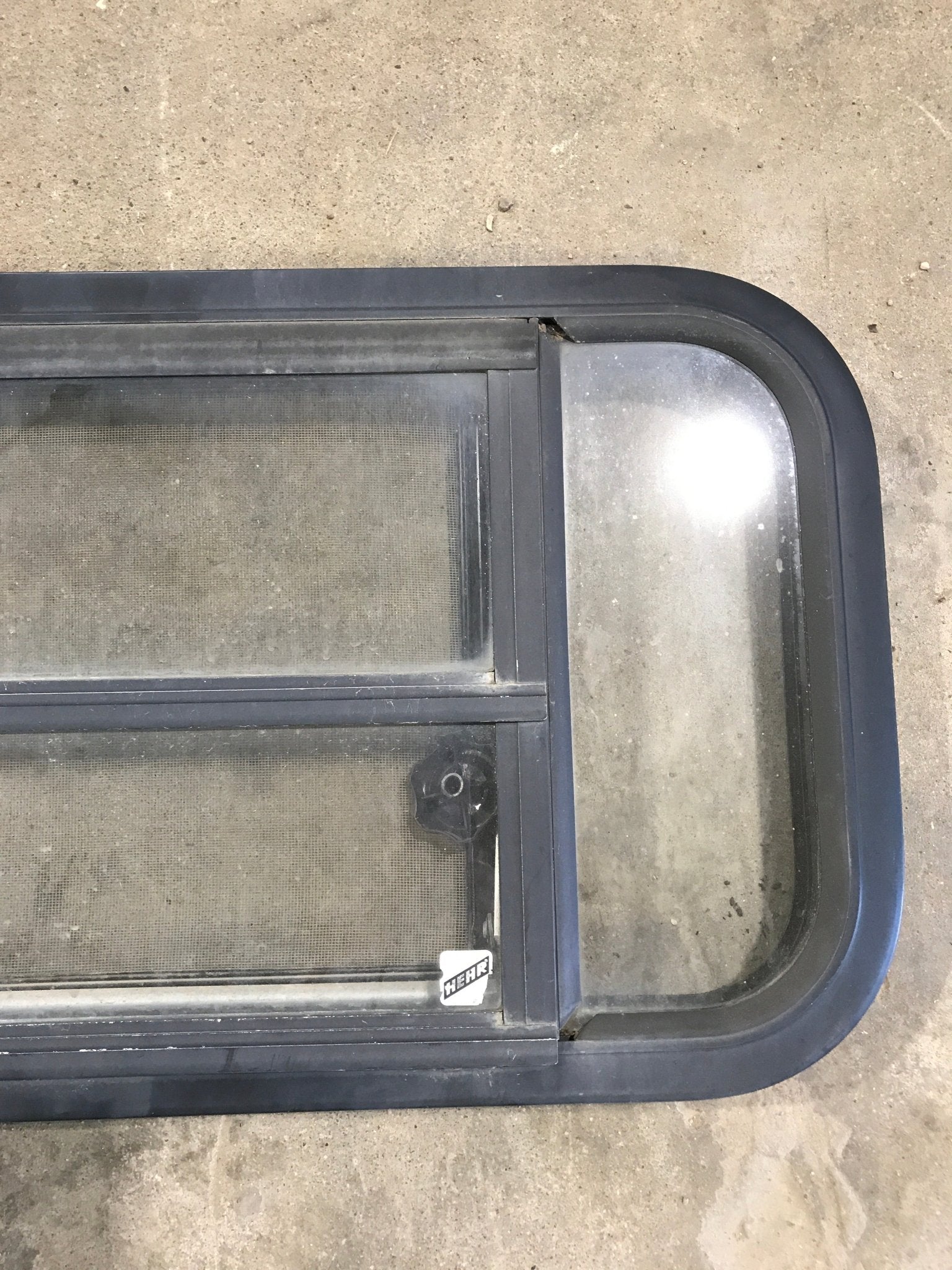 Used Black Radius Opening Window : 29 1/2" W x 14 1/2" H x 2" - Young Farts RV Parts