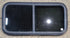Used Black Radius Opening Window : 29 1/2" W x 14 1/4" H x 1 1/4" - Young Farts RV Parts