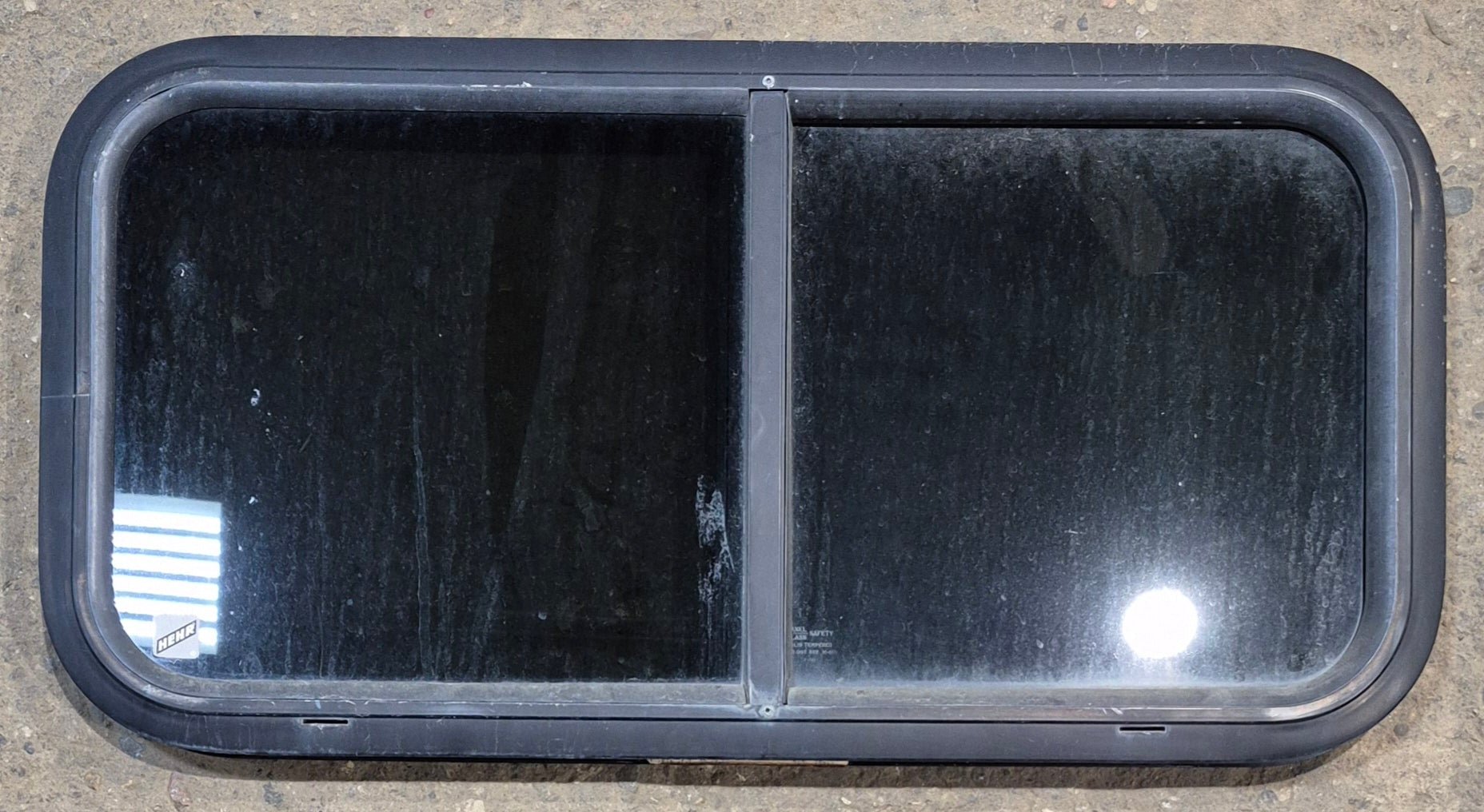 Used Black Radius Opening Window : 29 1/2" W x 14 1/4" H x 1 1/4" - Young Farts RV Parts