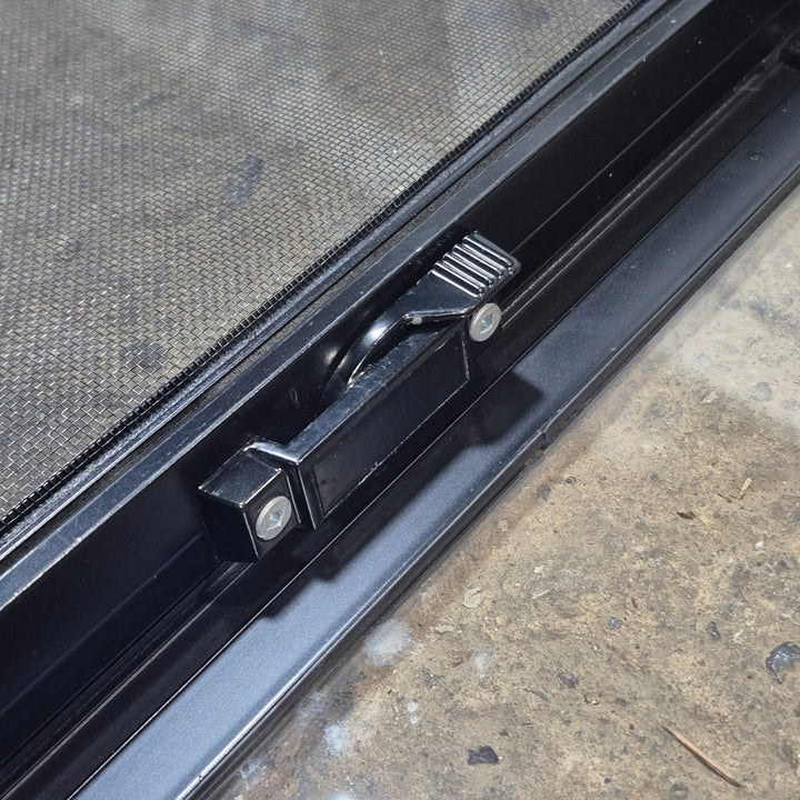 Used Black Radius Opening Window : 29 1/2" W x 14 3/4" H x 1 7/8" - Young Farts RV Parts
