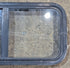 Used Black Radius Opening Window : 29 1/2" W x 14 3/4" H x 1 7/8" - Young Farts RV Parts
