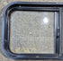 Used Black Radius Opening Window : 29 1/2" W x 14 3/4" H x 1 7/8" - Young Farts RV Parts