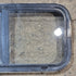 Used Black Radius Opening Window : 29 1/2" W x 14 3/4" H x 1 7/8" - Young Farts RV Parts