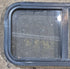 Used Black Radius Opening Window : 29 1/2" W x 14 3/4" H x 1 7/8" - Young Farts RV Parts