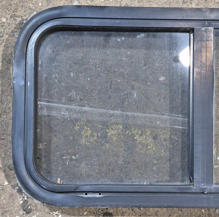 Used Black Radius Opening Window : 29 1/2" W x 14 3/4" H x 1 7/8" - Young Farts RV Parts