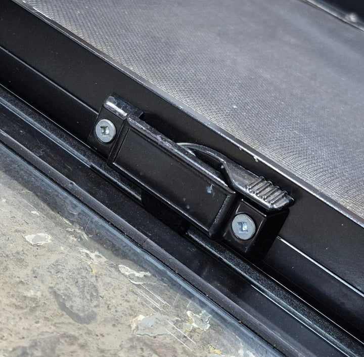 Used Black Radius Opening Window : 29 1/2" W x 14 3/4" H x 1 7/8" - Young Farts RV Parts