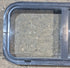 Used Black Radius Opening Window : 29 1/2" W x 14 3/4" H x 1 7/8" - Young Farts RV Parts