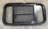 Used Black Radius Opening Window : 29 1/2" W x 14 3/4" H x 2" - Young Farts RV Parts