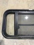 Used Black Radius Opening Window : 29 1/2" W x 14 3/4" H x 2" - Young Farts RV Parts