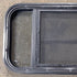 Used Black Radius Opening Window : 29 1/2" W x 14 5/8" H x 2" D - Young Farts RV Parts