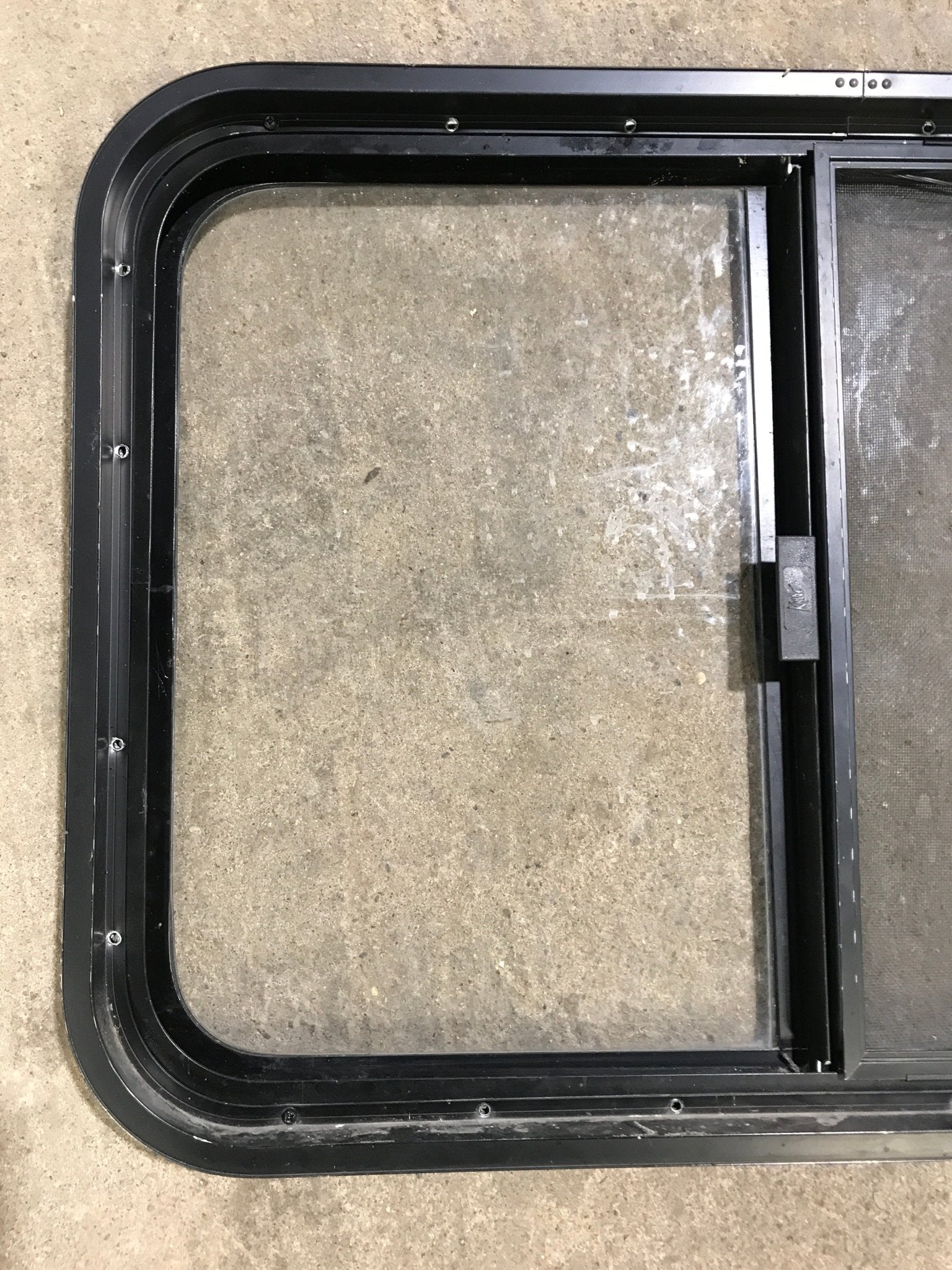 Used Black Radius Opening Window : 29 1/2" W x 21 1/2" H x 2" D - Young Farts RV Parts