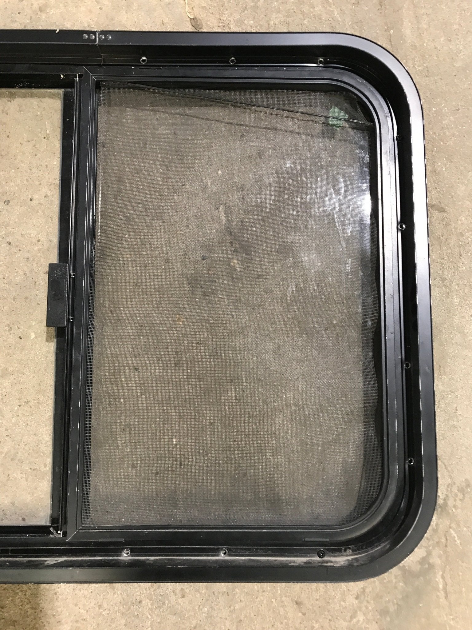 Used Black Radius Opening Window : 29 1/2" W x 21 1/2" H x 2" D - Young Farts RV Parts