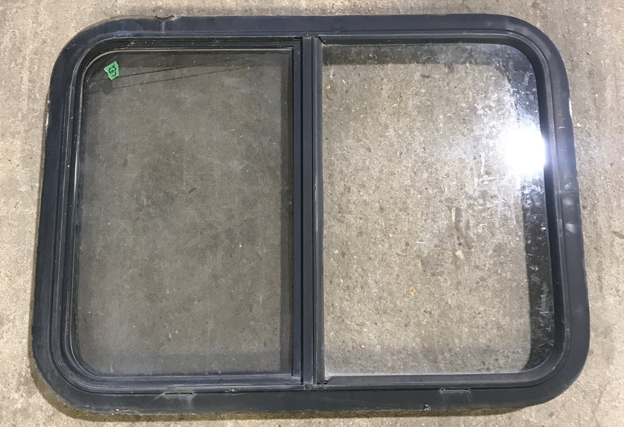 Used Black Radius Opening Window : 29 1/2" W x 21 1/2" H x 2" D - Young Farts RV Parts