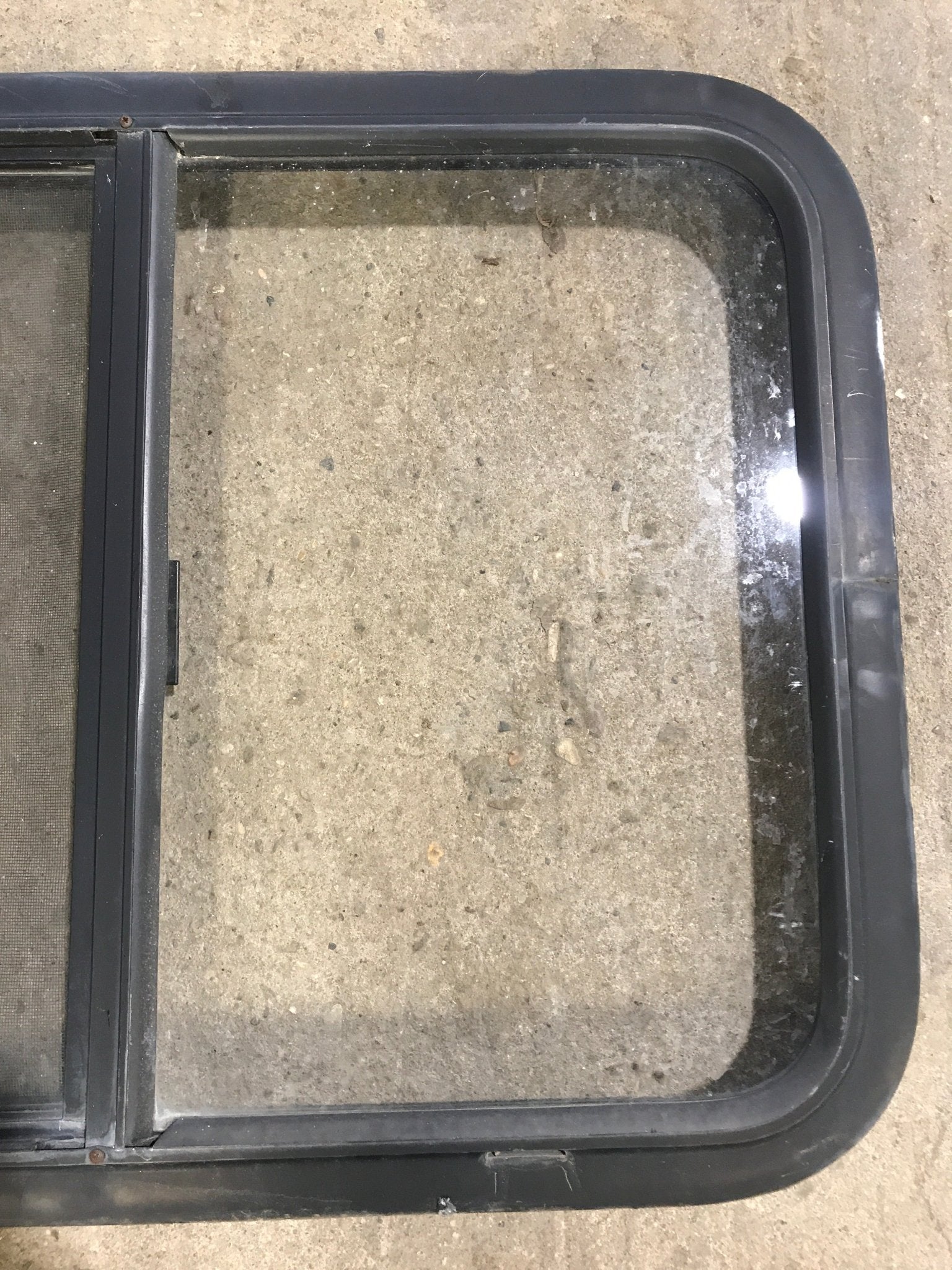 Used Black Radius Opening Window : 29 1/2" W x 21 1/2" H x 2" D - Young Farts RV Parts