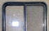 Used Black Radius Opening Window : 29 1/2" W x 34 1/4" H x 1 7/8" - Young Farts RV Parts