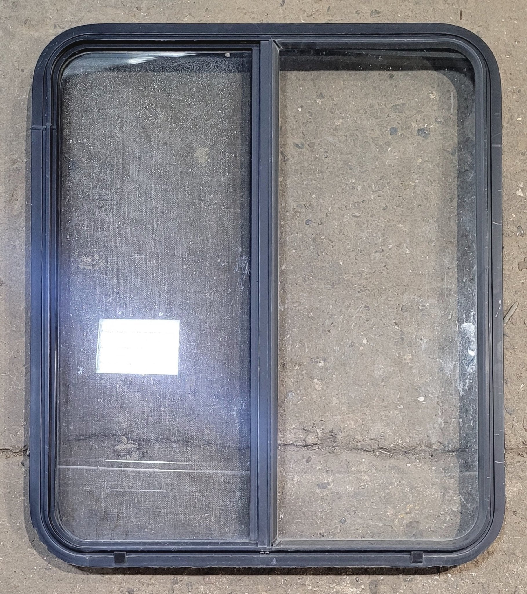 Used Black Radius Opening Window : 29 1/2" W x 34 1/4" H x 1 7/8" - Young Farts RV Parts