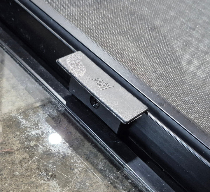 Used Black Radius Opening Window : 29 1/4" W x 14 1/4" H x 1 3/4" - Young Farts RV Parts