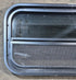 Used Black Radius Opening Window : 29 1/4" W x 14 1/4" H x 1 3/4" - Young Farts RV Parts