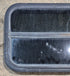 Used Black Radius Opening Window : 29 1/4" W x 17 1/2" H x 1 1/4" - Young Farts RV Parts