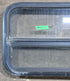 Used Black Radius Opening Window : 29 1/4" W x 17 1/2" H x 1 7/8" D - Young Farts RV Parts