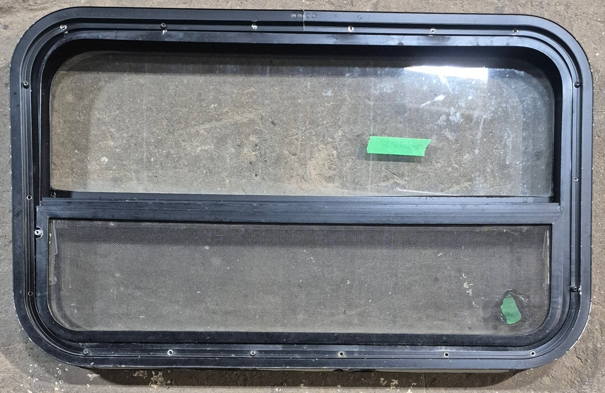 Used Black Radius Opening Window : 29 1/4" W x 17 1/2" H x 1 7/8" D - Young Farts RV Parts