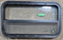 Used Black Radius Opening Window : 29 1/4" W x 17 1/2" H x 1 7/8" D - Young Farts RV Parts