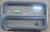 Used Black Radius Opening Window : 29 1/4" W x 17 1/2" H x 1 7/8" D - Young Farts RV Parts