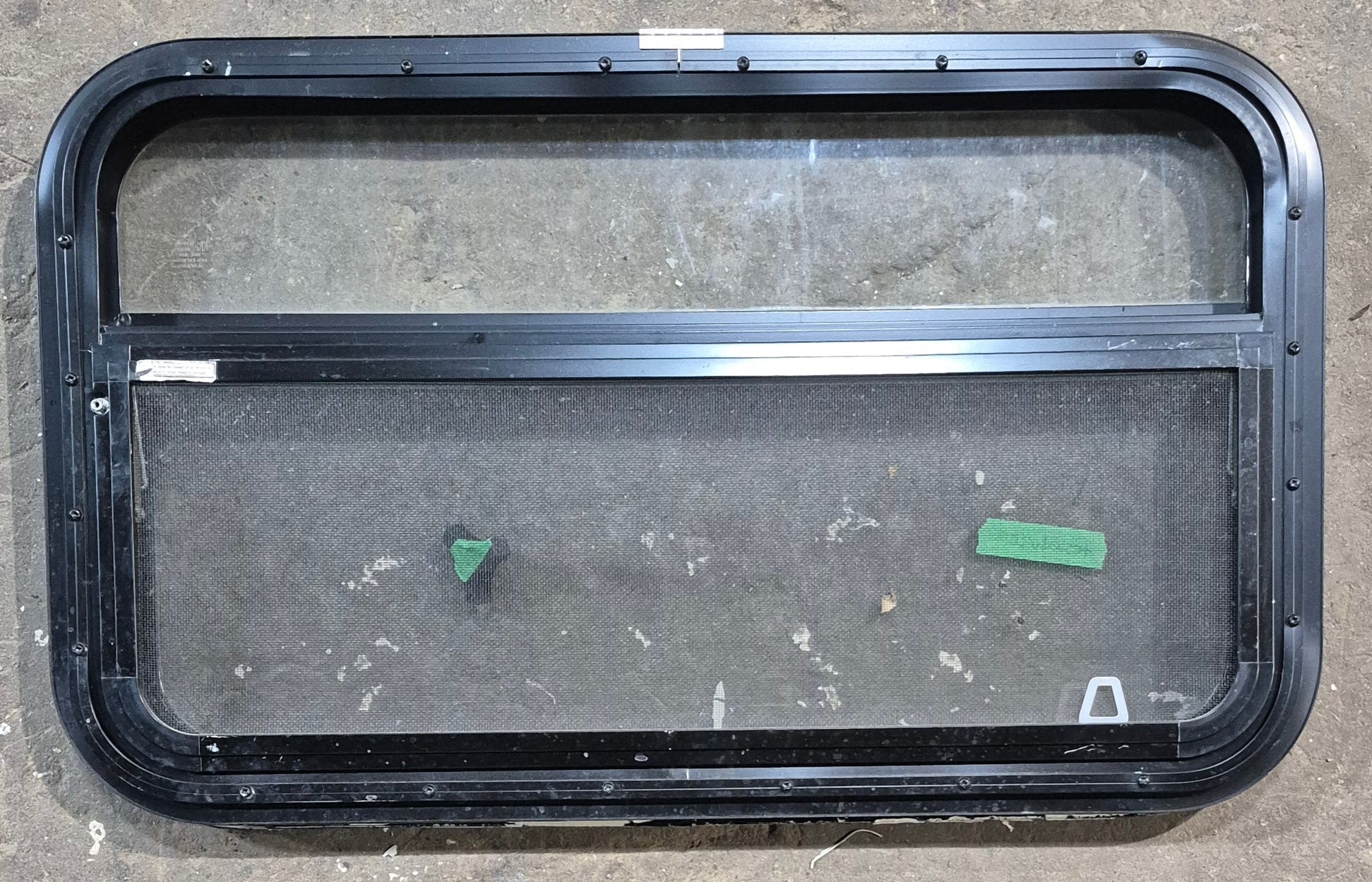 Used Black Radius Opening Window : 29 1/4" W x 17 1/4" H x 1 1/4" D - Young Farts RV Parts