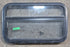 Used Black Radius Opening Window : 29 1/4" W x 17 1/4" H x 1 1/4" D - Young Farts RV Parts