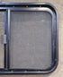 Used Black Radius Opening Window : 29 1/4" W x 19 1/2" H x 1 7/8" - Young Farts RV Parts