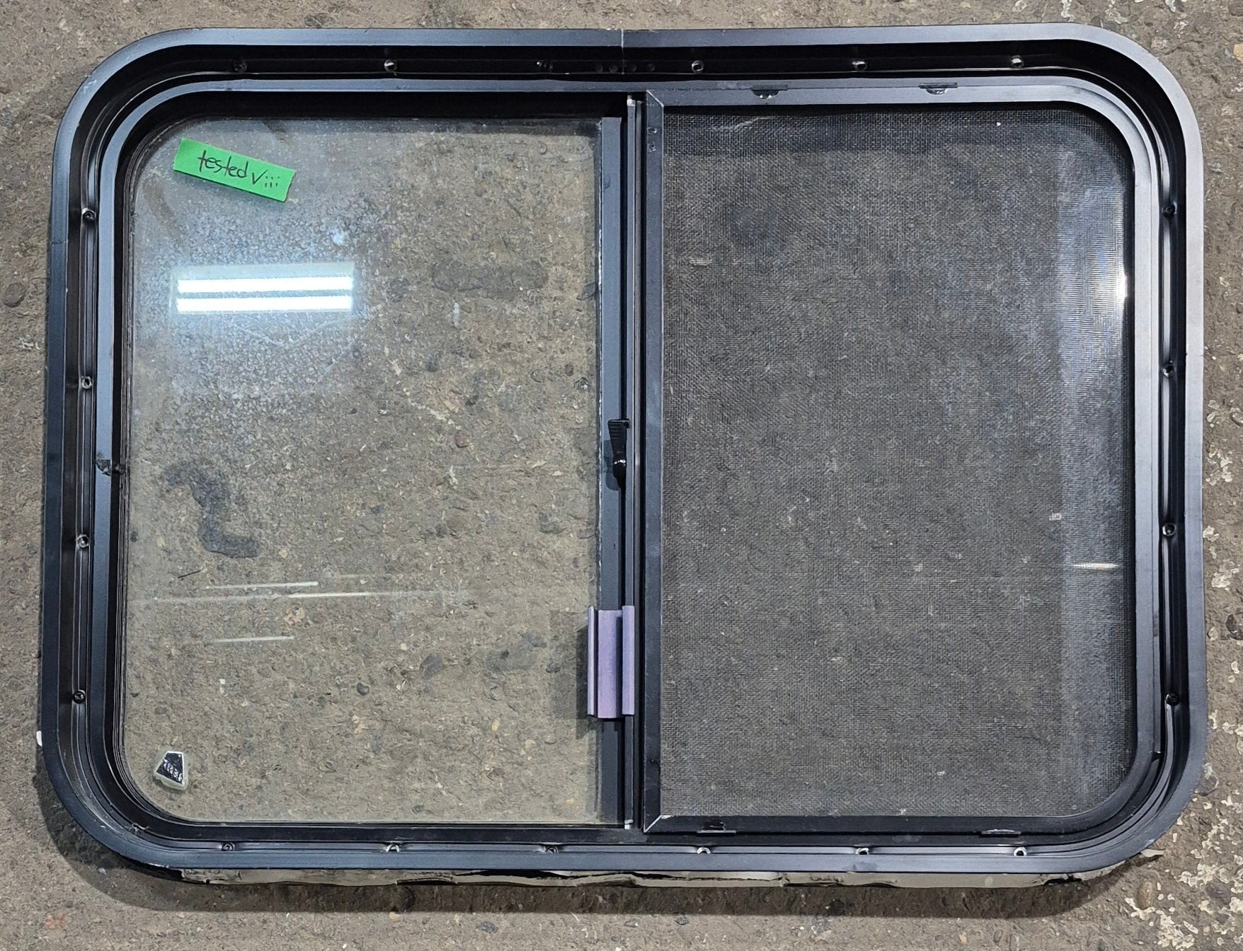 Used Black Radius Opening Window : 29 1/4" W x 21 1/2" H x 1 7/8" D - Young Farts RV Parts