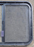 Used Black Radius Opening Window : 29 1/4" W x 21 1/2" H x 1 7/8" D - Young Farts RV Parts