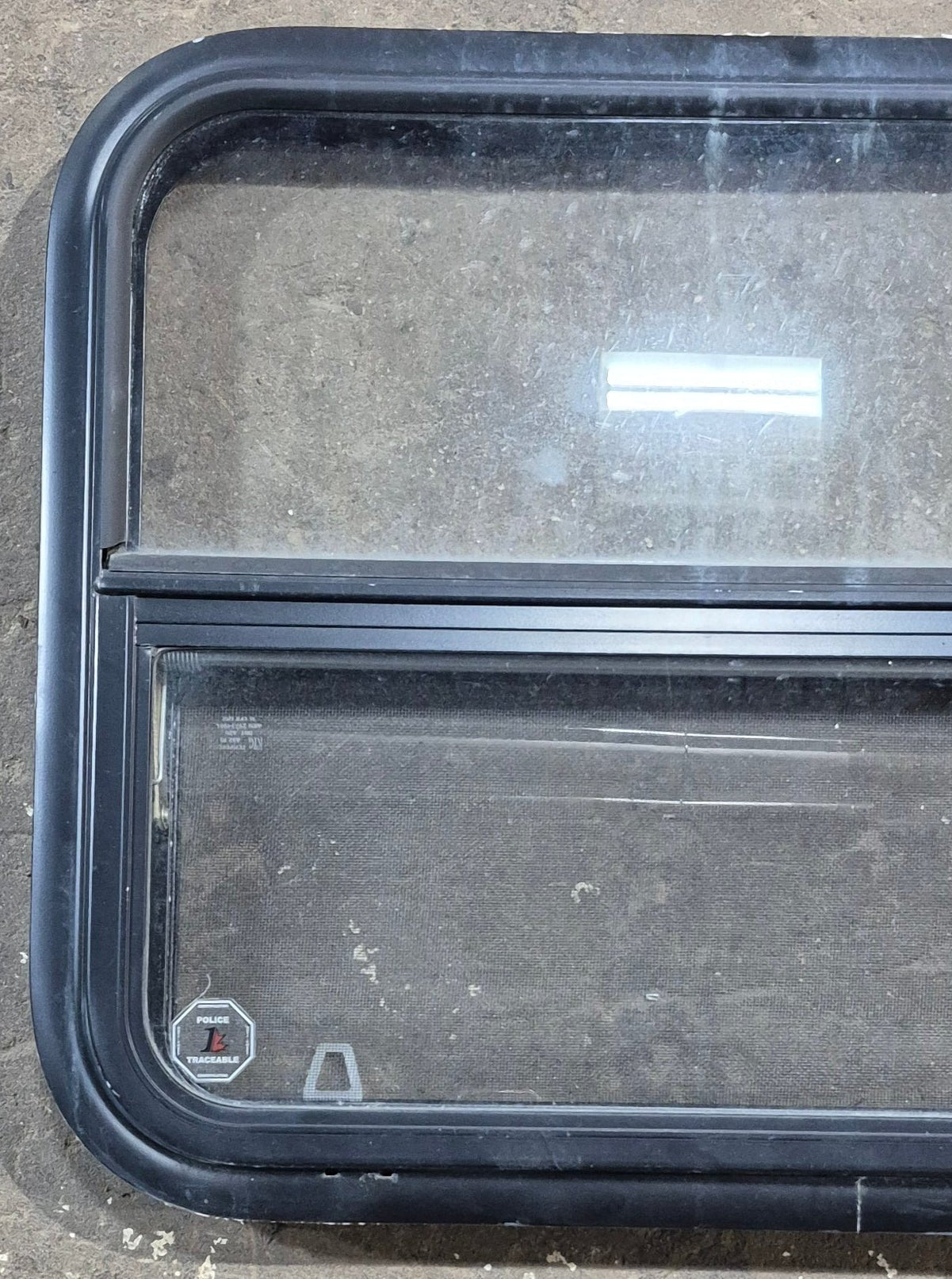 Used Black Radius Opening Window : 29 1/4" W x 21 1/4" H x 1 1/4" D - Young Farts RV Parts