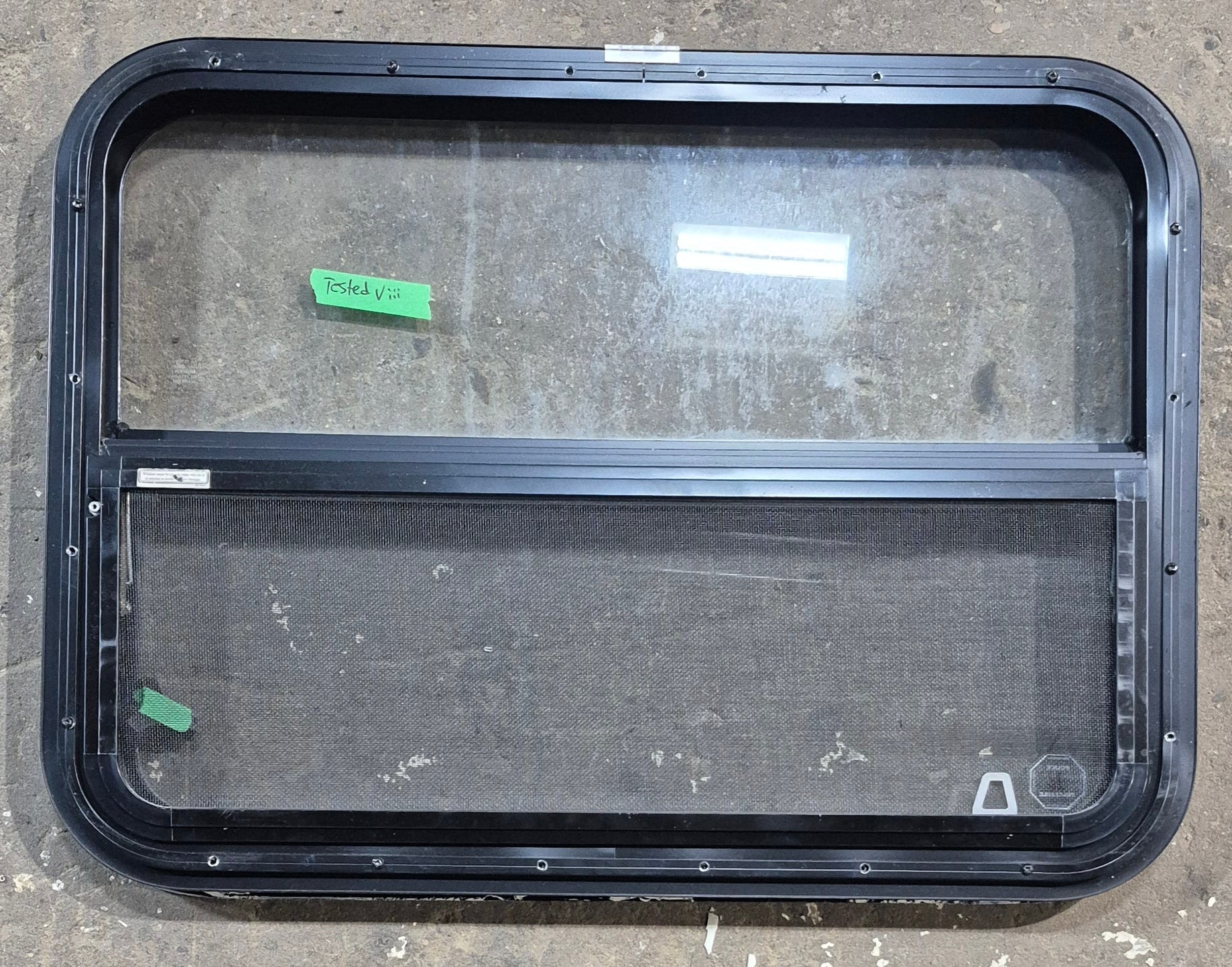 Used Black Radius Opening Window : 29 1/4" W x 21 1/4" H x 1 1/4" D - Young Farts RV Parts