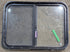 Used Black Radius Opening Window : 29 1/4" W x 21 1/4" H x 1 3/4" D - Young Farts RV Parts