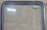 Used Black Radius Opening Window : 29 1/4" W x 34 1/2" H x 1 7/8" D - Young Farts RV Parts