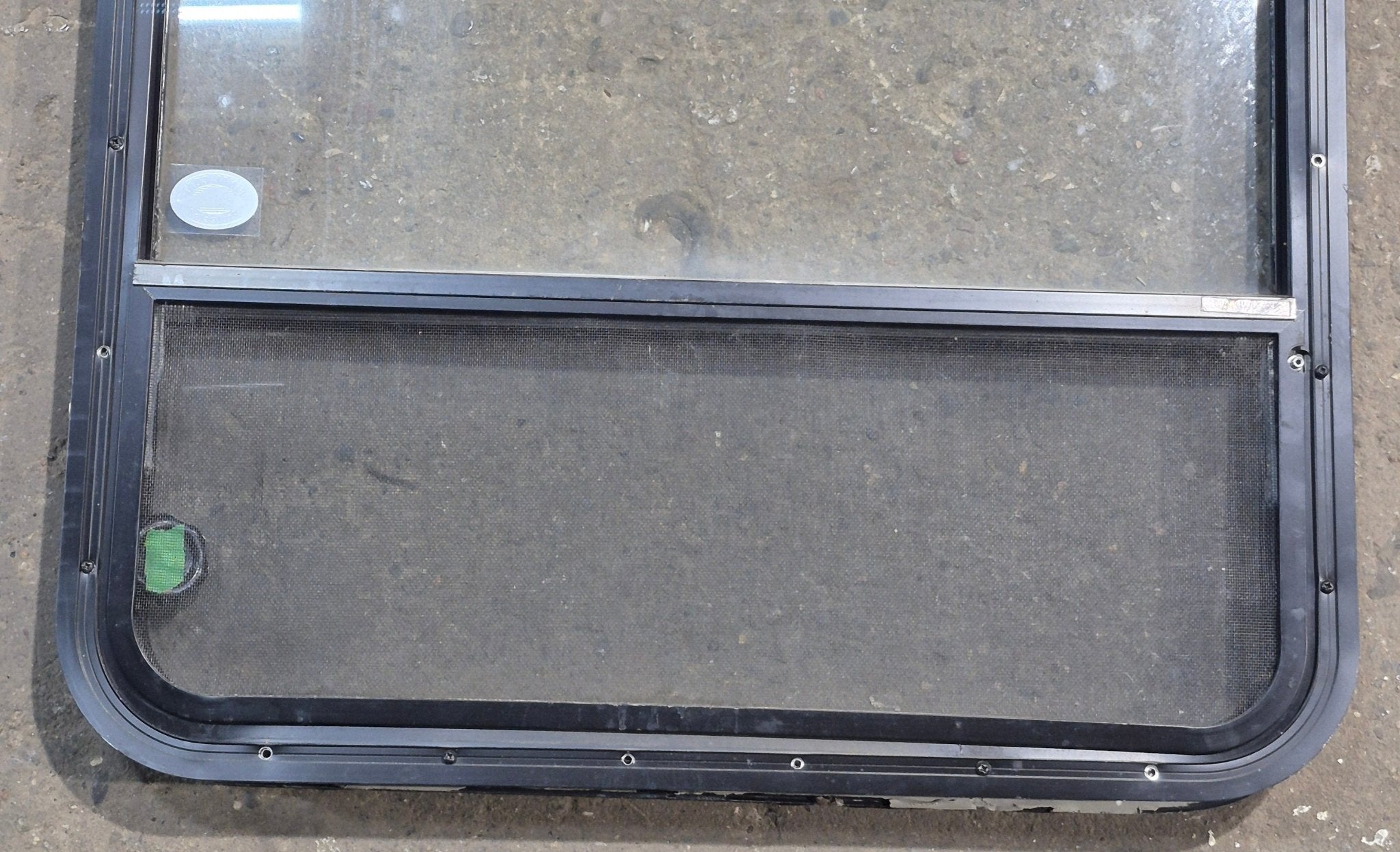 Used Black Radius Opening Window : 29 1/4" W x 34 1/2" H x 1 7/8" D - Young Farts RV Parts