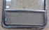 Used Black Radius Opening Window : 29 1/4" W x 34 1/2" H x 1 7/8" D - Young Farts RV Parts