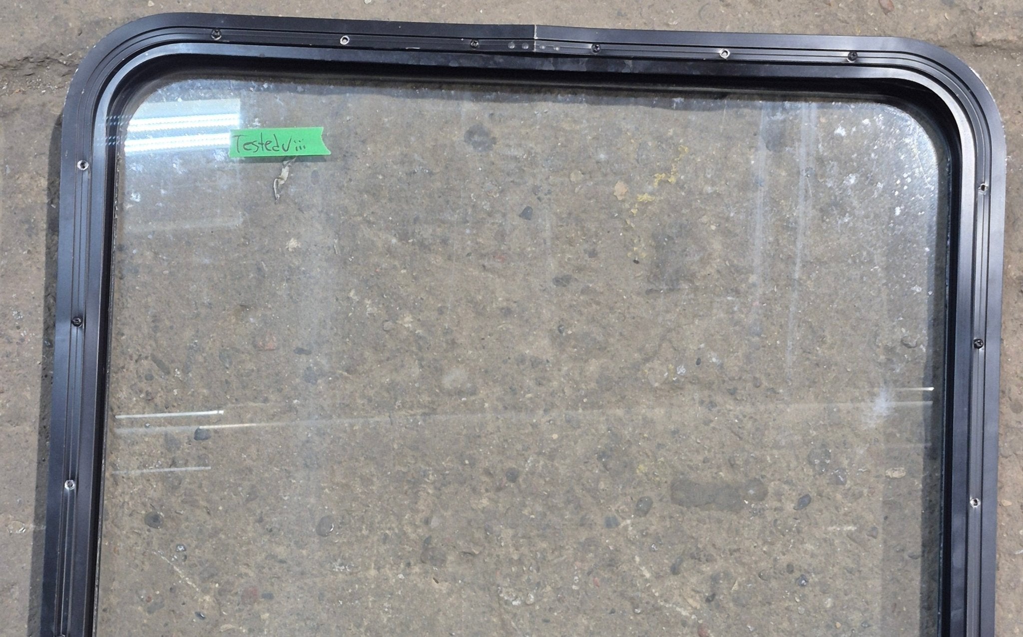 Used Black Radius Opening Window : 29 1/4" W x 34 1/2" H x 1 7/8" D - Young Farts RV Parts